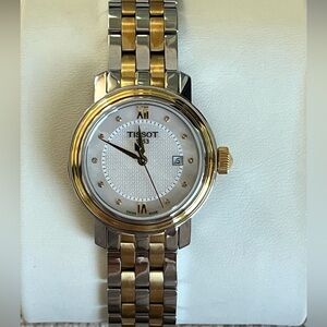 Tissot Two-Tone Gold and Silver Watch - Never worn 
Missing the box
